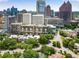 Scenic city view featuring modern buildings, lush trees, and clear blue skies in a vibrant urban environment at 145 15Th Ne St # 826, Atlanta, GA 30309