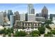 A full exterior view of the property and surrounding cityscape at 145 15Th Ne St # 826, Atlanta, GA 30309