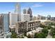 Aerial view of the building with the Atlanta skyline in the background at 145 15Th Ne St # 826, Atlanta, GA 30309