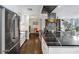 Modern kitchen featuring stainless steel appliances, a large island, and an open concept design at 145 15Th Ne St # 826, Atlanta, GA 30309