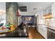 Kitchen boasts black countertops, white cabinets, and seamless flow to a modern living space at 145 15Th Ne St # 826, Atlanta, GA 30309