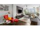 Chic living room featuring contemporary decor, stylish lighting, and large windows with city views at 145 15Th Ne St # 826, Atlanta, GA 30309