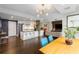 Open-concept living and dining area with modern finishes, bright lighting, and sleek furnishings at 145 15Th Ne St # 826, Atlanta, GA 30309