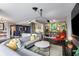 Spacious living room with a modern sofa, open to the kitchen, featuring stylish decor and lighting at 145 15Th Ne St # 826, Atlanta, GA 30309