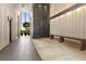 The lobby is modern with bench, rug, and art at 145 15Th Ne St # 826, Atlanta, GA 30309
