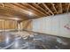 Unfinished basement with concrete walls, wooden frame construction and unique flooring at 1618 Chancery Ln, Lithia Springs, GA 30122
