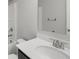 Modern bathroom with a white sink, stylish fixtures, and a clean, bright ambiance at 1618 Chancery Ln, Lithia Springs, GA 30122