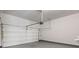 A clean and spacious two-car garage featuring an automatic door opener at 1618 Chancery Ln, Lithia Springs, GA 30122