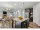 Open concept kitchen with granite island and barstool seating with stainless steel appliances at 1618 Chancery Ln, Lithia Springs, GA 30122