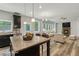 Beautiful kitchen and living room combination with a stone fireplace and granite countertops at 1618 Chancery Ln, Lithia Springs, GA 30122