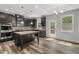 Well-equipped kitchen with granite countertops, stainless steel appliances, and an island at 1618 Chancery Ln, Lithia Springs, GA 30122