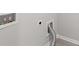 Bright laundry room featuring modern water and drain hookups and ventilation at 1618 Chancery Ln, Lithia Springs, GA 30122