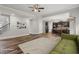 Spacious living room featuring hardwood floors, stylish decor, and an open layout perfect for entertaining at 1618 Chancery Ln, Lithia Springs, GA 30122
