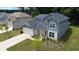 Aerial view featuring house with landscaping and a long driveway at 4234 Freight St, Tucker, GA 30084