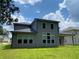 Backyard with a covered back porch, modern house style with large windows at 4234 Freight St, Tucker, GA 30084