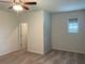 Bedroom with ceiling fan, window, and a closet at 4234 Freight St, Tucker, GA 30084
