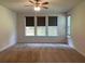 Spacious bedroom with large windows overlooking the fenced-in backyard at 4234 Freight St, Tucker, GA 30084