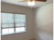 Bedroom with ceiling fan and window with natural light at 4234 Freight St, Tucker, GA 30084
