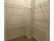 Walk-in closet features ample storage with multiple shelves for organization at 4234 Freight St, Tucker, GA 30084