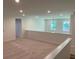 Bright and airy upstairs loft area with plenty of natural light and neutral carpeting at 4234 Freight St, Tucker, GA 30084