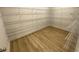 Walk-in pantry with wire shelving and wood-look flooring providing organized storage at 4234 Freight St, Tucker, GA 30084