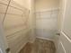 Walk-in closet with shelving for clothes and storage at 4234 Freight St, Tucker, GA 30084