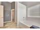 Bright bathroom with shower, bathtub, and tile floor at 529 Dasheill Ln, Atlanta, GA 30349