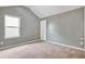 Bedroom with neutral carpet, gray walls, a window and door to the left side at 529 Dasheill Ln, Atlanta, GA 30349