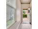 Entryway with window blind, open front door showing outside view of a house at 529 Dasheill Ln, Atlanta, GA 30349