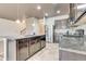 Modern kitchen showcases granite countertops and stainless steel appliances, perfect for cooking and entertaining guests at 529 Dasheill Ln, Atlanta, GA 30349