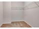 Walk-in closet with white shelving at 529 Dasheill Ln, Atlanta, GA 30349