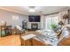 Living room with hardwood floors, cozy seating, fireplace, and access to a balcony with lots of natural light at 970 Sidney Marcus Blvd # 1217, Atlanta, GA 30324