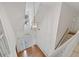 Grand two story foyer with hardwood floors, staircase, and decorative chandelier at 2866 Wynford Sw Dr, Marietta, GA 30064