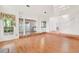 Spacious living room with columns, open floor plan and stairs to the second floor at 2866 Wynford Sw Dr, Marietta, GA 30064