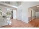 Spacious living room featuring a fireplace, large windows, and hardwood floors at 2866 Wynford Sw Dr, Marietta, GA 30064