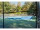 Well-maintained community tennis court surrounded by lush greenery at 2866 Wynford Sw Dr, Marietta, GA 30064