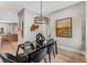 Well-lit dining room boasts contemporary decor and a sleek glass table at 1099 North Ne Ave # 12, Atlanta, GA 30307