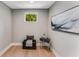 Sitting room with hardwood flooring, modern decor, and natural light from a window at 1099 North Ne Ave # 12, Atlanta, GA 30307
