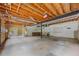 Spacious unfinished basement with exposed beams and walls ready for your creative design at 629 Pine Ter, Canton, GA 30114