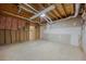 Unfinished basement with exposed ceiling and stubbed for bath offers great potential for customization at 629 Pine Ter, Canton, GA 30114