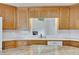 Kitchen boasts a view of the living room through the pass-through window at 629 Pine Ter, Canton, GA 30114