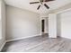 Bedroom featuring a ceiling fan and large closet at 4467 Boatmans Cv, Stone Mountain, GA 30083