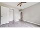 Bedroom featuring a ceiling fan and closet with ample storage space at 4467 Boatmans Cv, Stone Mountain, GA 30083