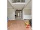 Wide open foyer space with a view to the back of the house and the fireplace at 4467 Boatmans Cv, Stone Mountain, GA 30083
