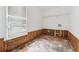 The laundry room has exposed studs and plywood subfloor at 4467 Boatmans Cv, Stone Mountain, GA 30083