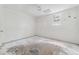 Room featuring a window, cracked walls, and a distressed floor at 4467 Boatmans Cv, Stone Mountain, GA 30083