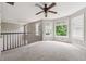 Upstairs room with large windows offering lots of natural light and outdoor views at 4467 Boatmans Cv, Stone Mountain, GA 30083
