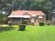Charming brick home with a well-maintained lawn and covered front porch at 1712 Clifton Se Way, Atlanta, GA 30316