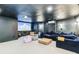 Basement with a dark color scheme features a projector, large screen, comfortable seating, and ample space for entertainment at 2200 Major Loring Sw Way, Marietta, GA 30064