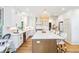Modern kitchen with white cabinetry, a large island, stainless steel appliances, and natural light at 2200 Major Loring Sw Way, Marietta, GA 30064